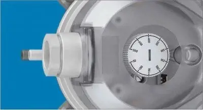 Scaled-adjustment-knob-on-930.-The-switching-pressure-can-be-adjusted-manual-by-hand-or-with-a-screwdriver-using-a-scaled-adjustment-knob-located-under-the-cover.webp